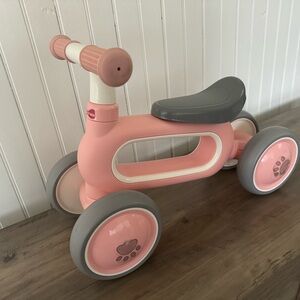 Pink toddler balance bike